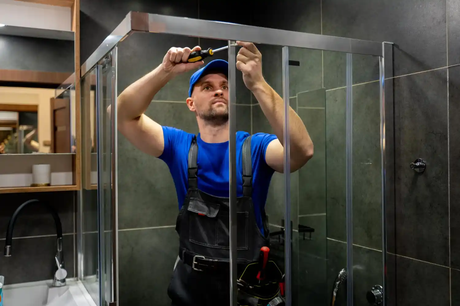 Experienced shower installers fitting a new shower system in Southampton