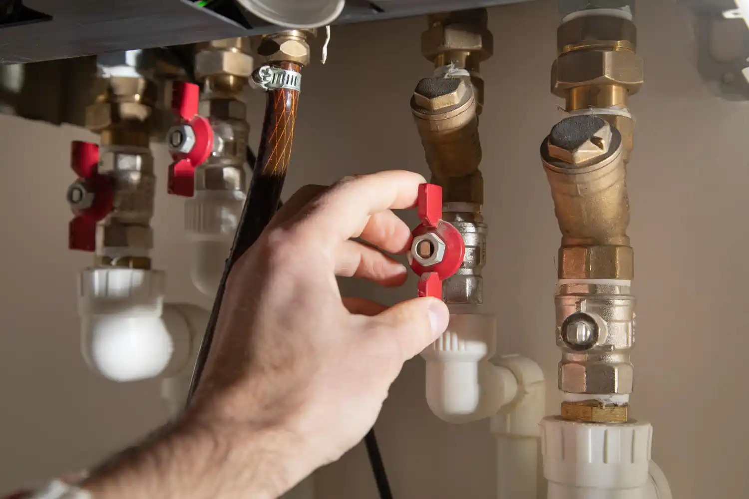 Kitchen pipe repair service by plumber in Plumpton