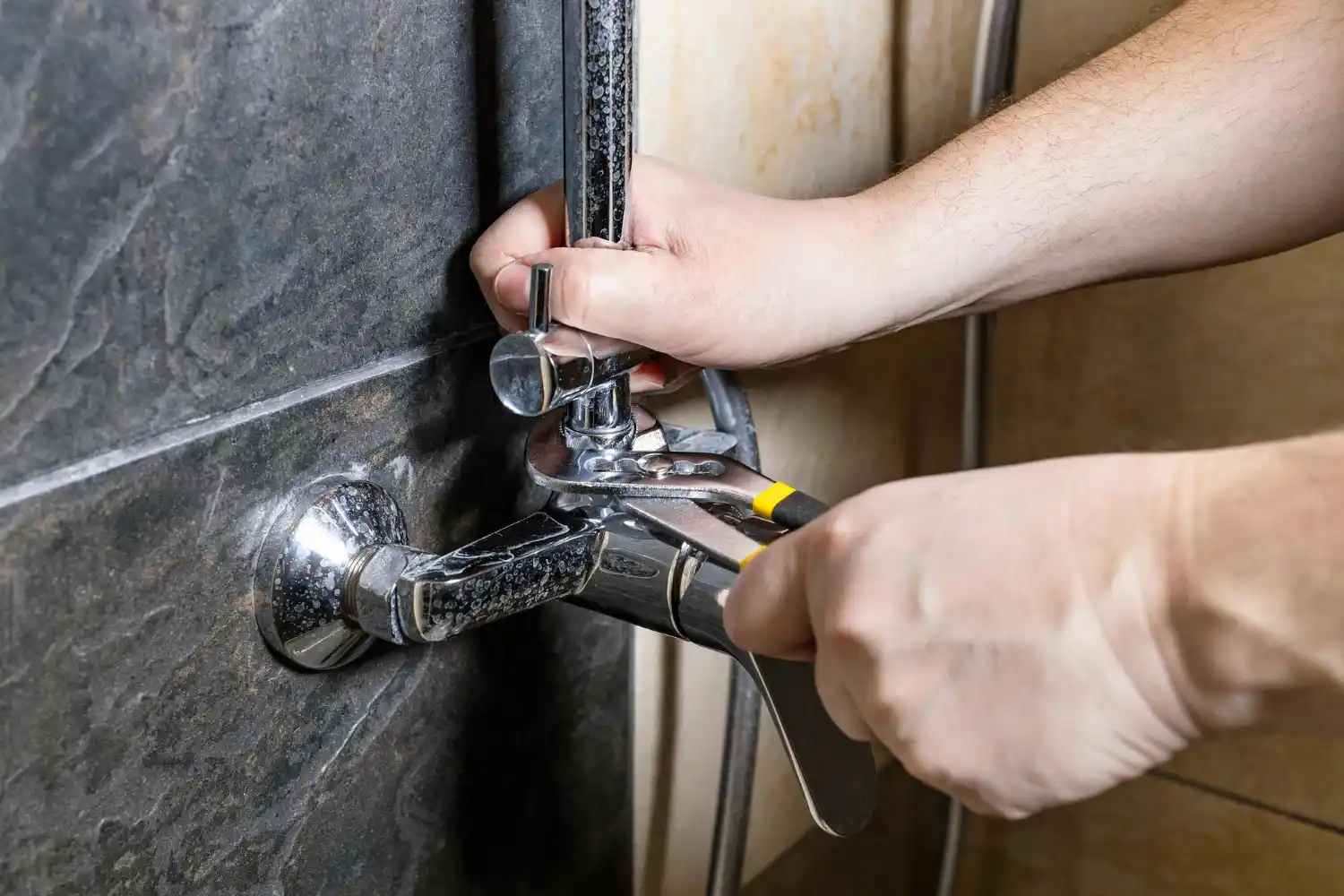 Professional plumber installing a modern shower system in a Bournemouth bathroom